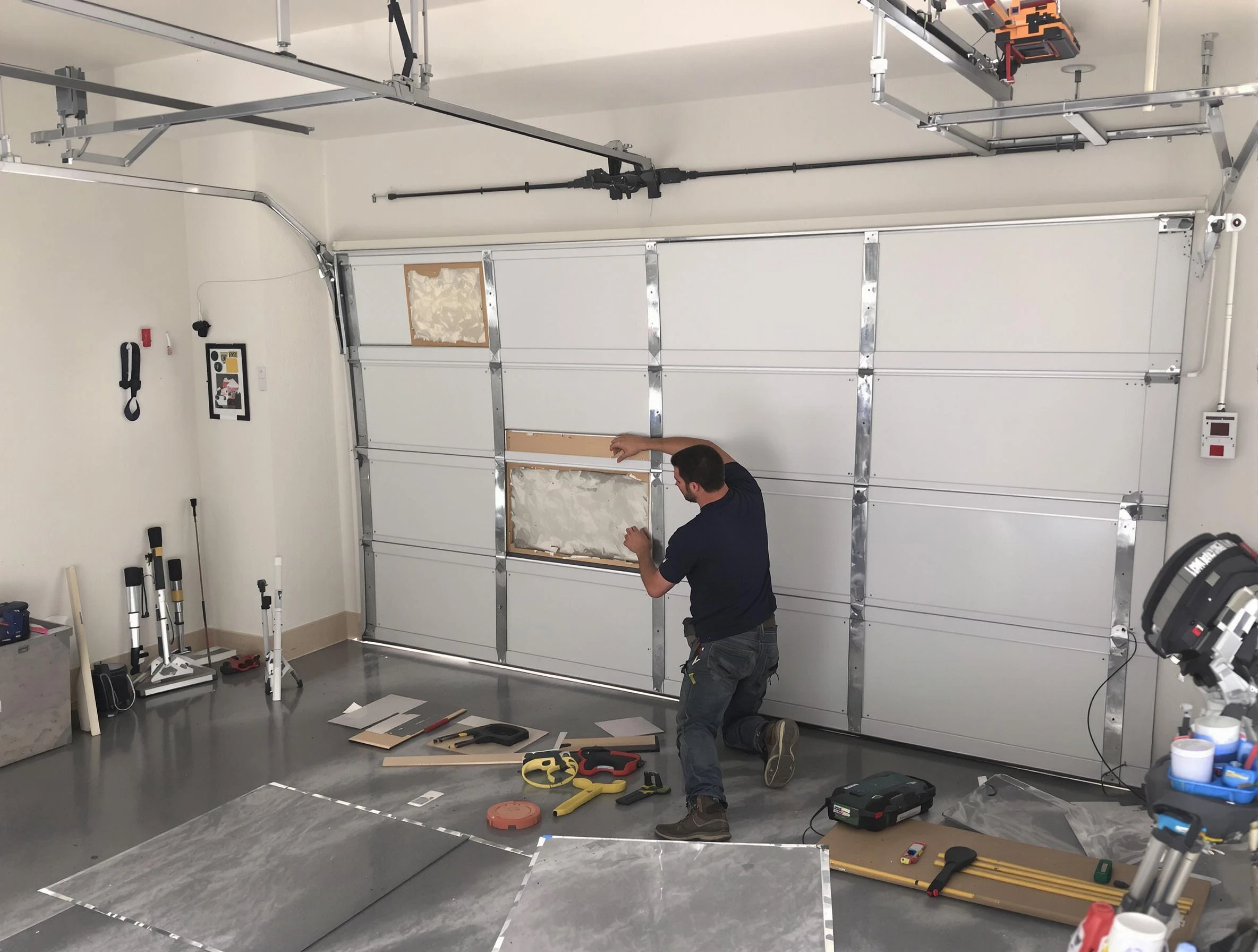 Garage Door Panel Repair in Taylorsville